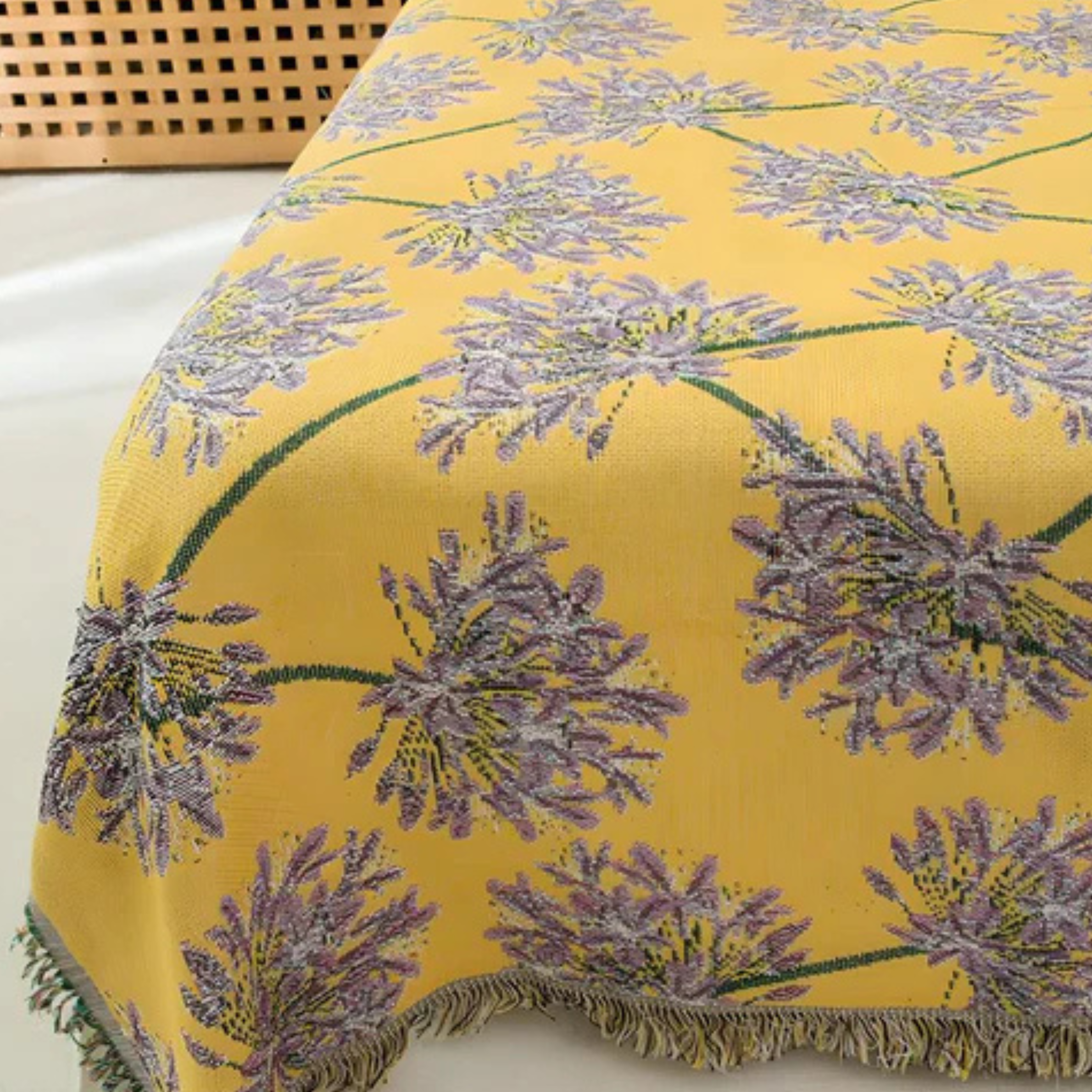 Boho-Inspired Tassel Blanket with Floral Detail