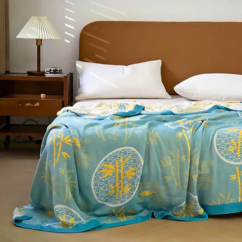 Nature-Inspired Bamboo Fiber Reversible Cooling Blanket