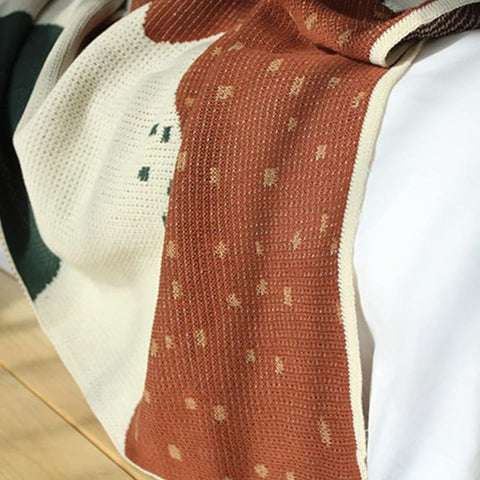 Cozy Modern Knit Blanket with Artistic Design