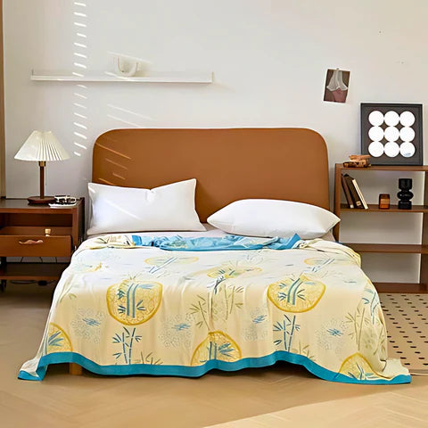 Nature-Inspired Bamboo Fiber Reversible Cooling Blanket
